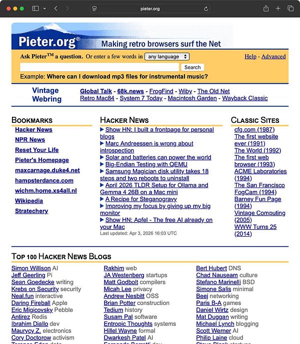 A blonde woman in a black top working on a laptop at a dark wooden table with a cup of coffee and a wireless mouse.