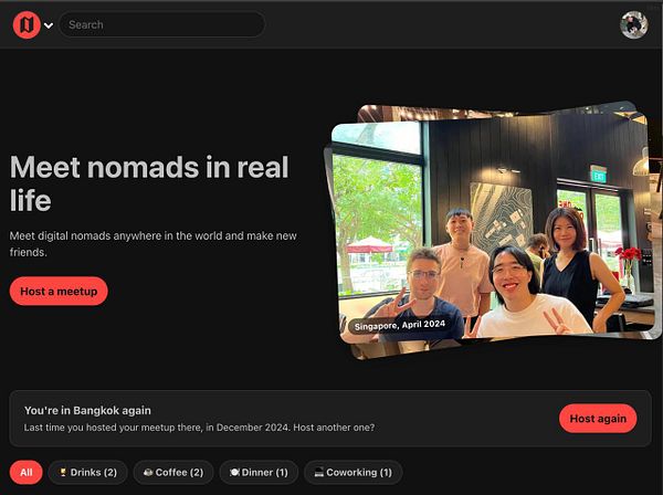 User interface of a digital nomad meetup platform showing options to host meetups with a photo from a previous meetup in Singapore.