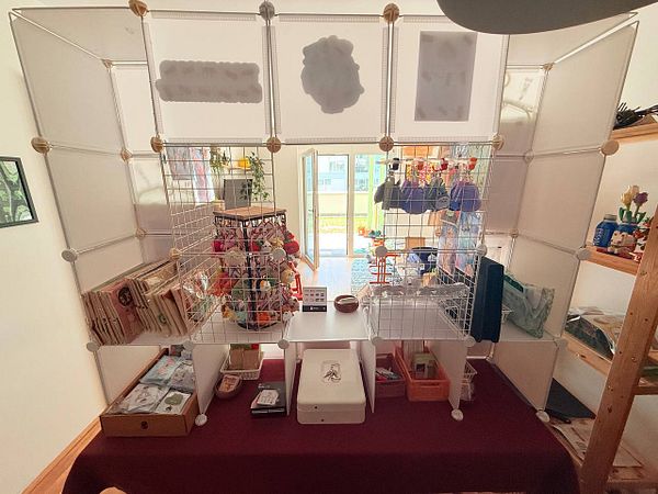 A prototype vendor booth setup featuring various products and display elements.