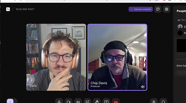 Close-up of a person recording audiobook narration with a microphone and script in hand.