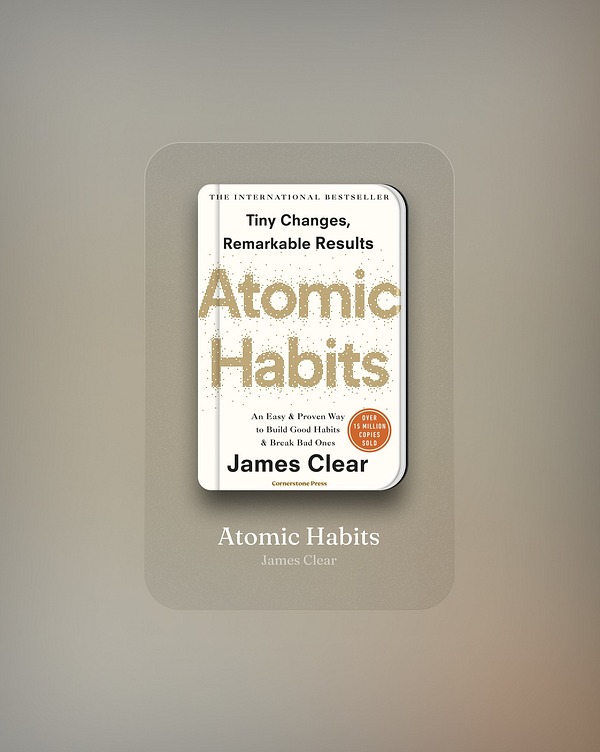 A digital book cover for 'Atomic Habits' by James Clear.