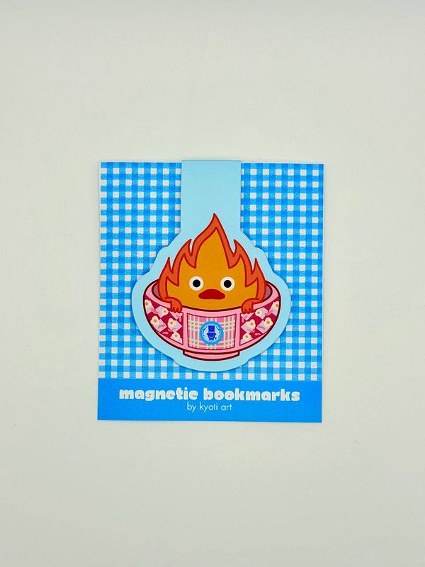 A colorful packaging design for magnetic bookmarks featuring a cartoon character.