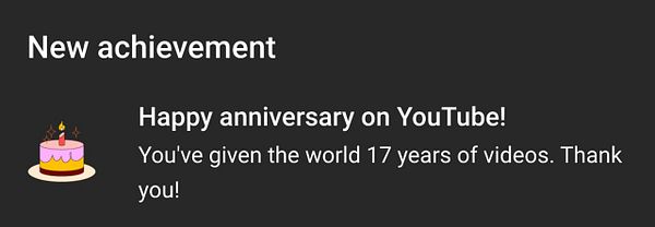 A celebratory notification about a YouTube achievement.