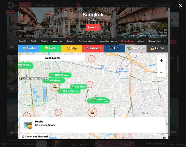 A detailed hand-drawn map showing streets, landmarks, and green spaces around Amsterdam's city center.
