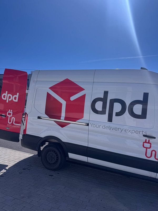 A DPD delivery van is parked, highlighting concerns about improper delivery methods for perishable goods.