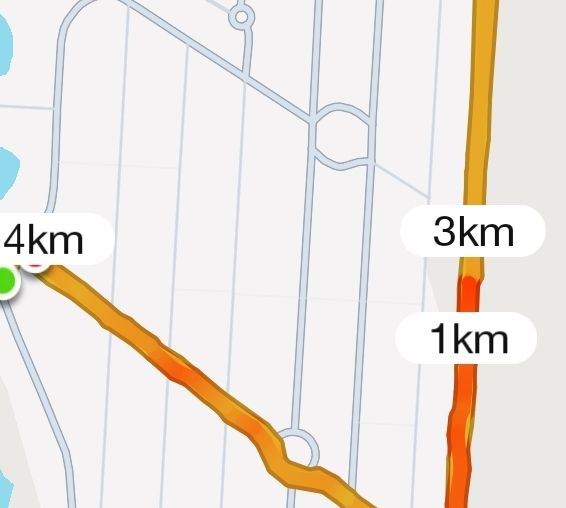 A map displaying a running route with distance markers.