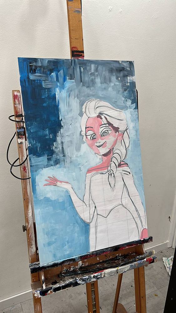 An acrylic painting in progress featuring a character with a braid and a white dress.