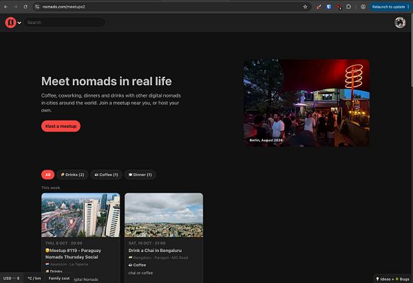 Webpage interface for nomads meetups featuring event listings and meetup hosting options with a dark theme.