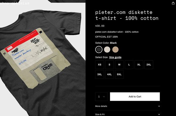 A black t-shirt featuring a vintage diskettes design is displayed alongside product details for purchase.