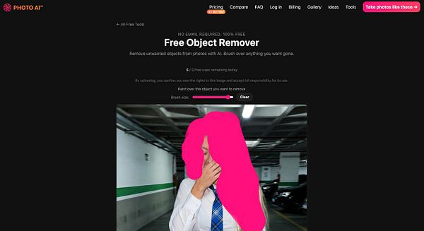 A serene beach scene with a white bird standing on a rock near calm, wavy waters during sunset.