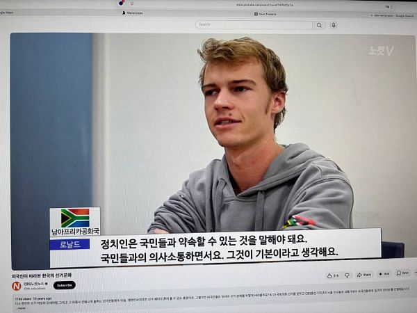 A screenshot of a Korean TV program featuring an elderly man singing, with Korean text subtitles at the bottom.