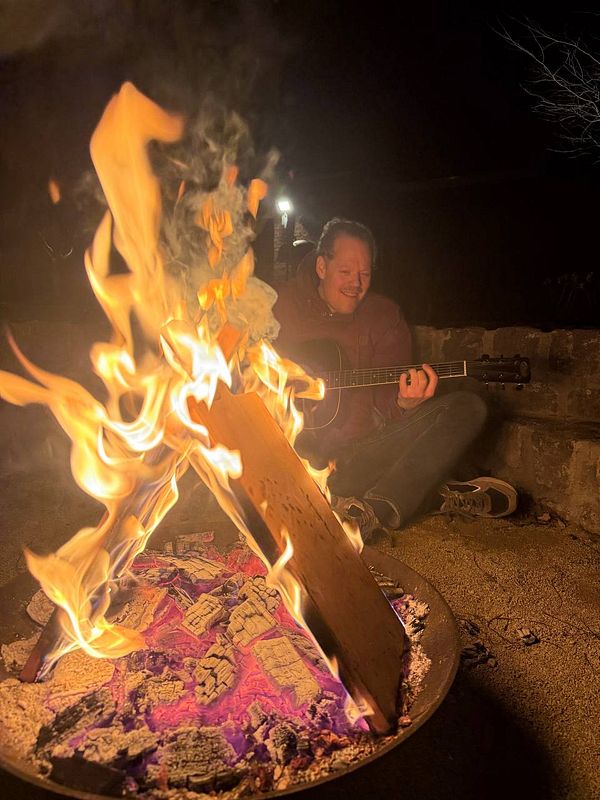 A humorous black-and-white illustration depicting a man and a woman each holding a beer bottle with a large red prohibition symbol over the image.