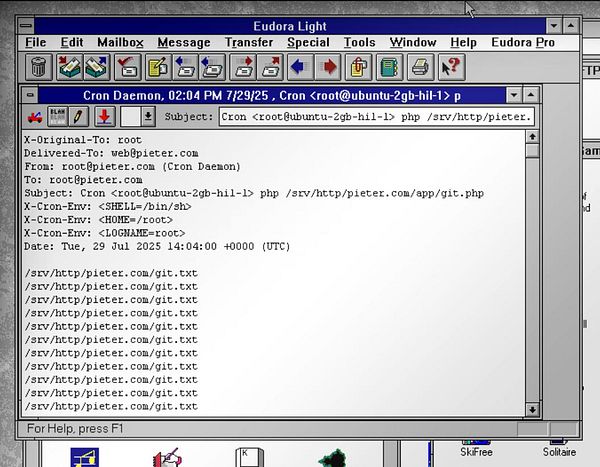 The image displays an email client interface showing a message from the Cron Daemon.