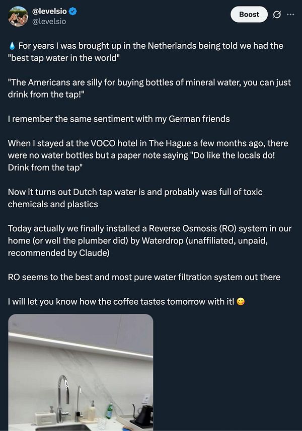Tweet discussing the installation of a Reverse Osmosis water filtration system in a home, with an attached photo of a kitchen sink area.