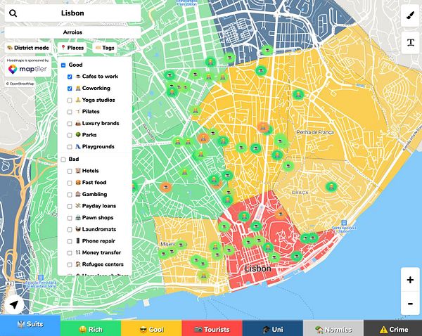A stylized illustrated map of an urban area with dense black building outlines and shaded green parks.