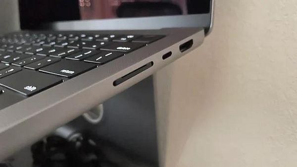 A close-up view of a laptop's side, showcasing its ports and keyboard.