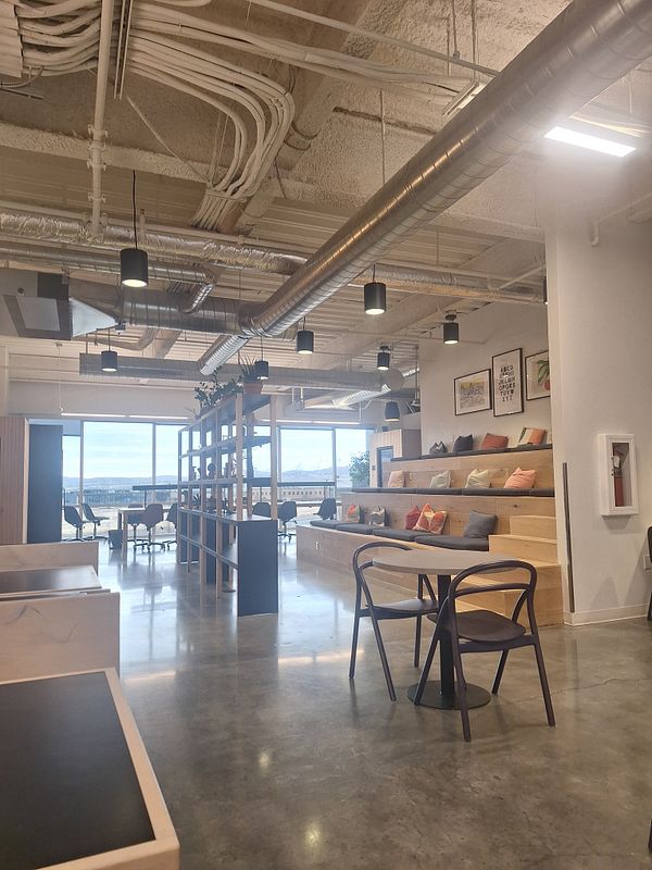 A modern, spacious interior designed for relaxation and productivity.