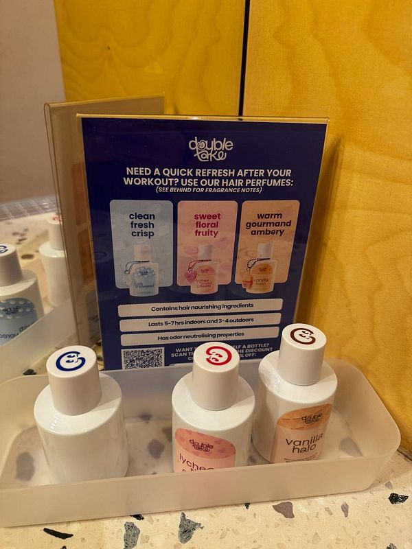 A display of hair perfumes designed for post-workout refreshment.