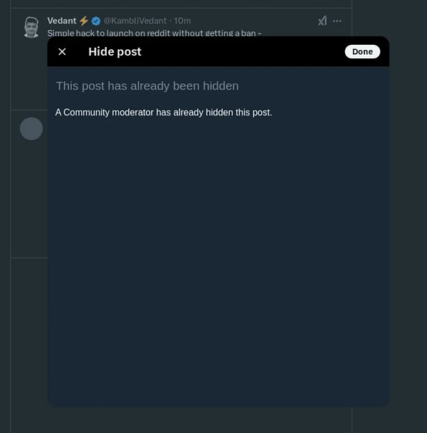 A notification indicates that a post has already been hidden by a community moderator.