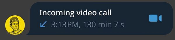 Cozy indoor scene of two people catching up over coffee with laptops and plants around.