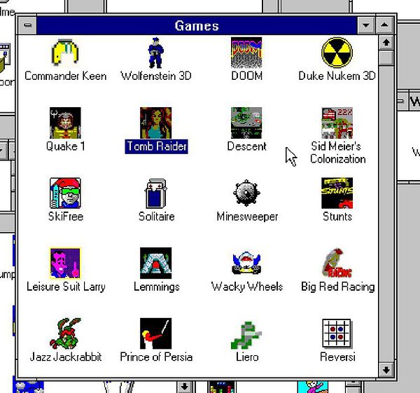 A Windows 3.11 games menu displaying various classic game icons.