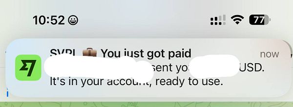 A notification on a smartphone screen indicates a payment has been received.