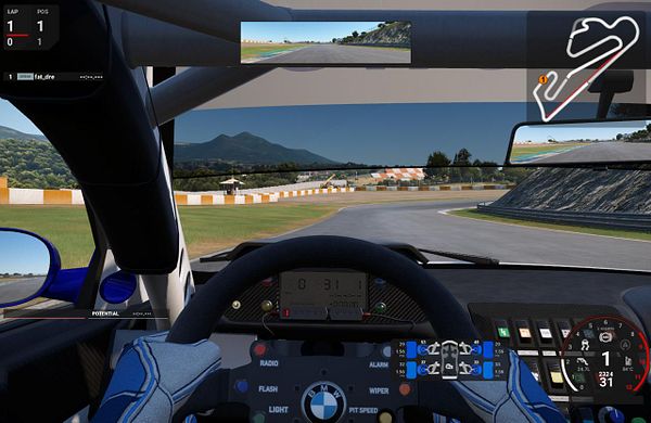 Screenshot of a racing video game showing a BMW M3 E46 GTR on a sunlit race track near a coastal landscape with interface elements and telemetry data.