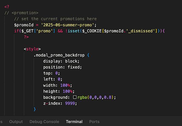 The image displays a code snippet for a promotional modal in a web application.