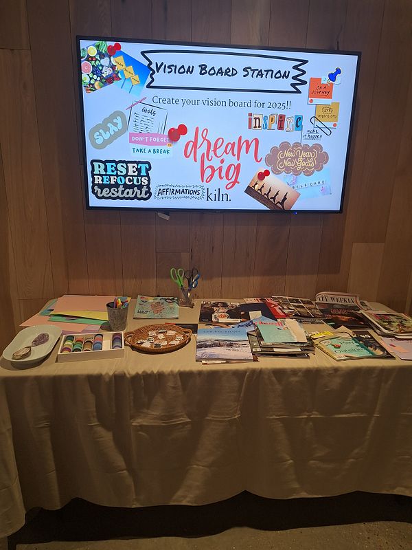 A vision board station set up for a creative event at Kiln coworking space.