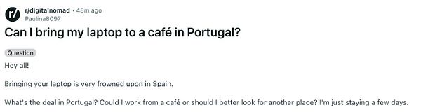 Screenshot of a Reddit post and comments discussing bringing a laptop into a cafe in Portugal, with visible negative votes.