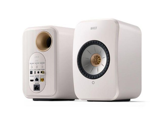 The image features a pair of KEF LSX II speakers in a sleek white design.