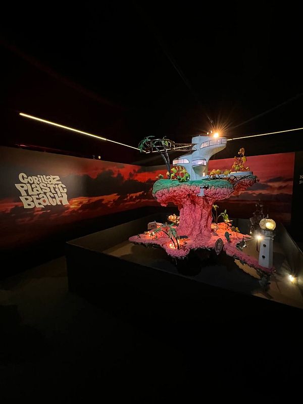 A vibrant art installation inspired by the Gorillaz's 'Plastic Beach' concept.