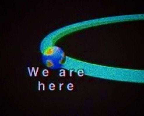 A graphic representation of Earth with the text 'We are here' prominently displayed.