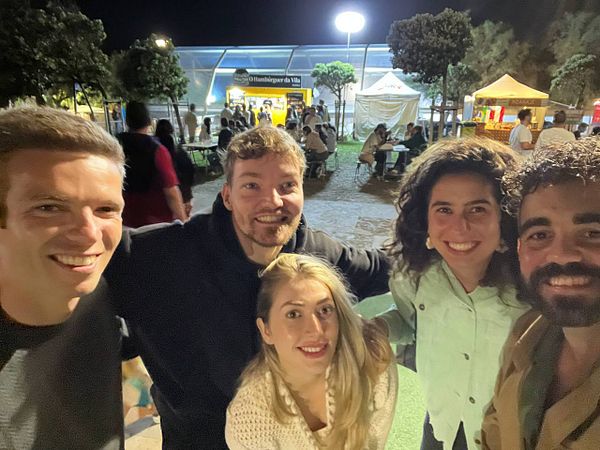 A group of five friends poses for a selfie at the Beerceira festival.