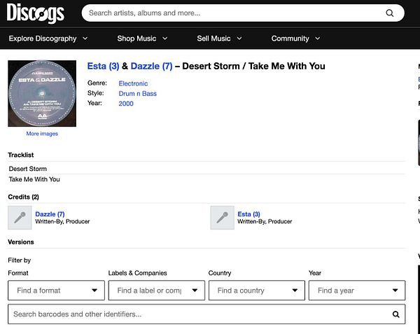 A moody nighttime photograph of a large outdoor event at a gas station, with vibrant colorful lighting and a crowd of people near parked vehicles under illuminated signage.