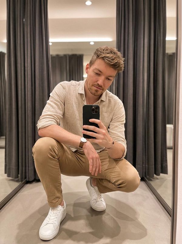 A vertical styled digital artwork featuring vibrant, fantasy-themed characters and patterns.