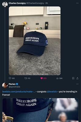 A navy blue cap with the slogan 'MAKE EUROPE GREAT AGAIN' is prominently displayed on a kitchen countertop.