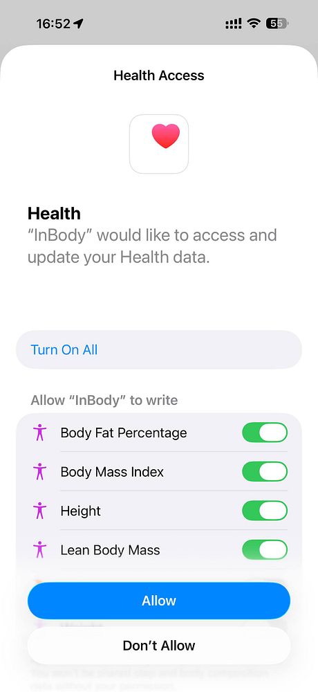 Screenshot of a health app interface displaying body composition data including body fat percentage, muscle mass, and BMI with a green banner indicating an update.