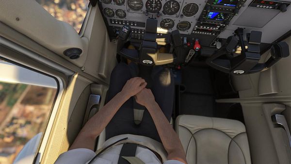 The image captures the cockpit view of a small aircraft from the pilot's perspective.