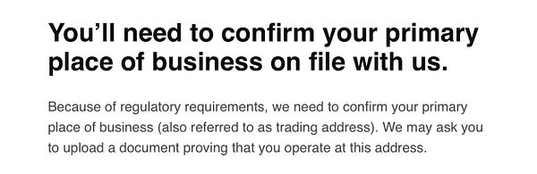 The image contains a message regarding the confirmation of a primary business address.