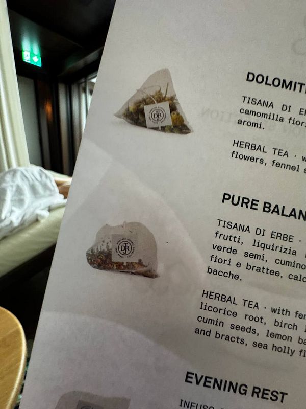 The image displays a menu featuring herbal tea options with microplastics-filled tea bags.