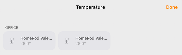 The image displays a temperature monitoring interface showing two HomePod devices in an office setting, both indicating a temperature of 28°C.