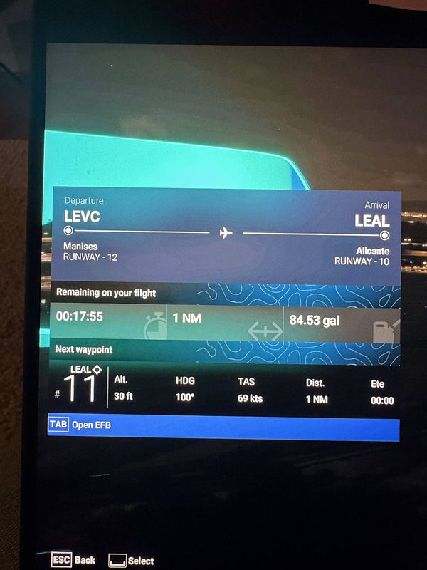 Flight information display for a journey from Valencia to Alicante.