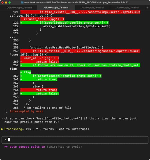 A terminal window displaying PHP code related to user profile photo handling.