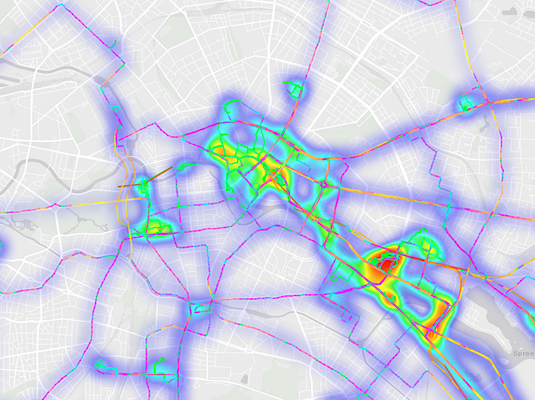 A colorful heatmap displaying speed-colored routes in an urban area.