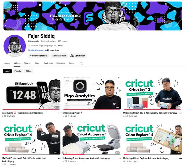YouTube thumbnail showing a man holding a camera next to a wall with the text 'Fajar Siddiq.'