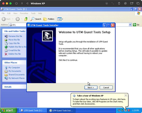 The image displays a Windows XP interface showing the UTM Guest Tools Installer setup window.