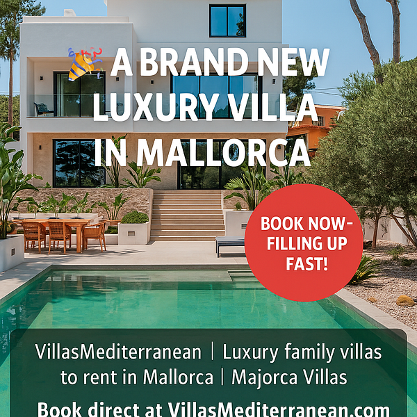 A modern luxury villa in Mallorca with a pool and outdoor dining area.