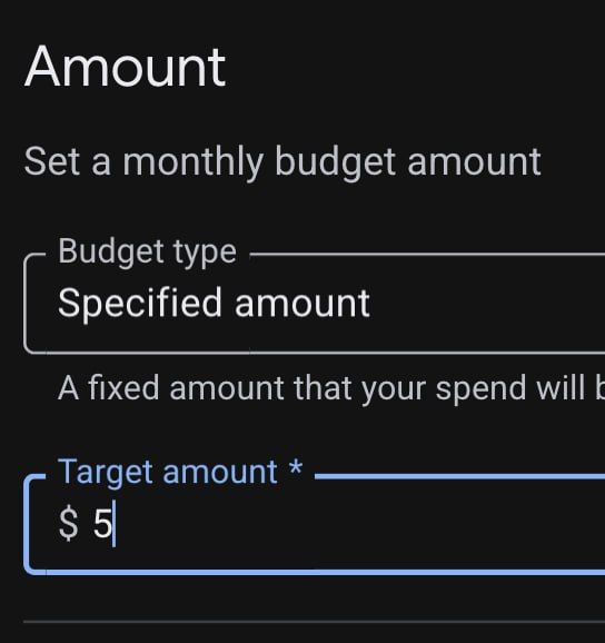 A neatly arranged set of budget notes including multiple 1-dollar bills and a 5-dollar bill on a wooden surface.