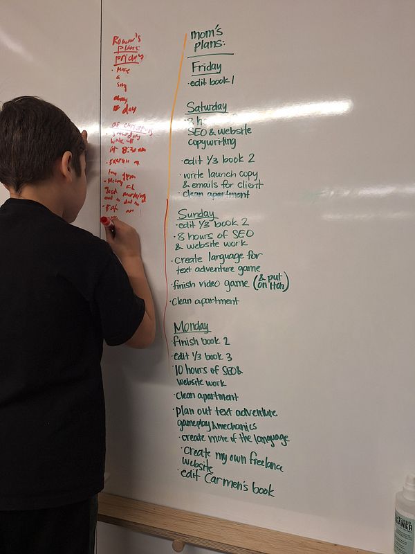 A child is writing weekend plans on a whiteboard, while a detailed list of tasks is visible.